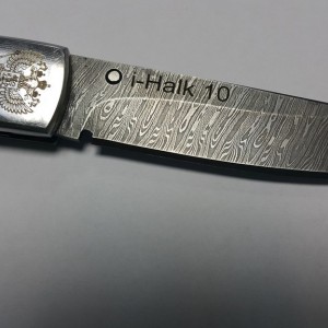 Складной нож маркирован на i-Halk 10